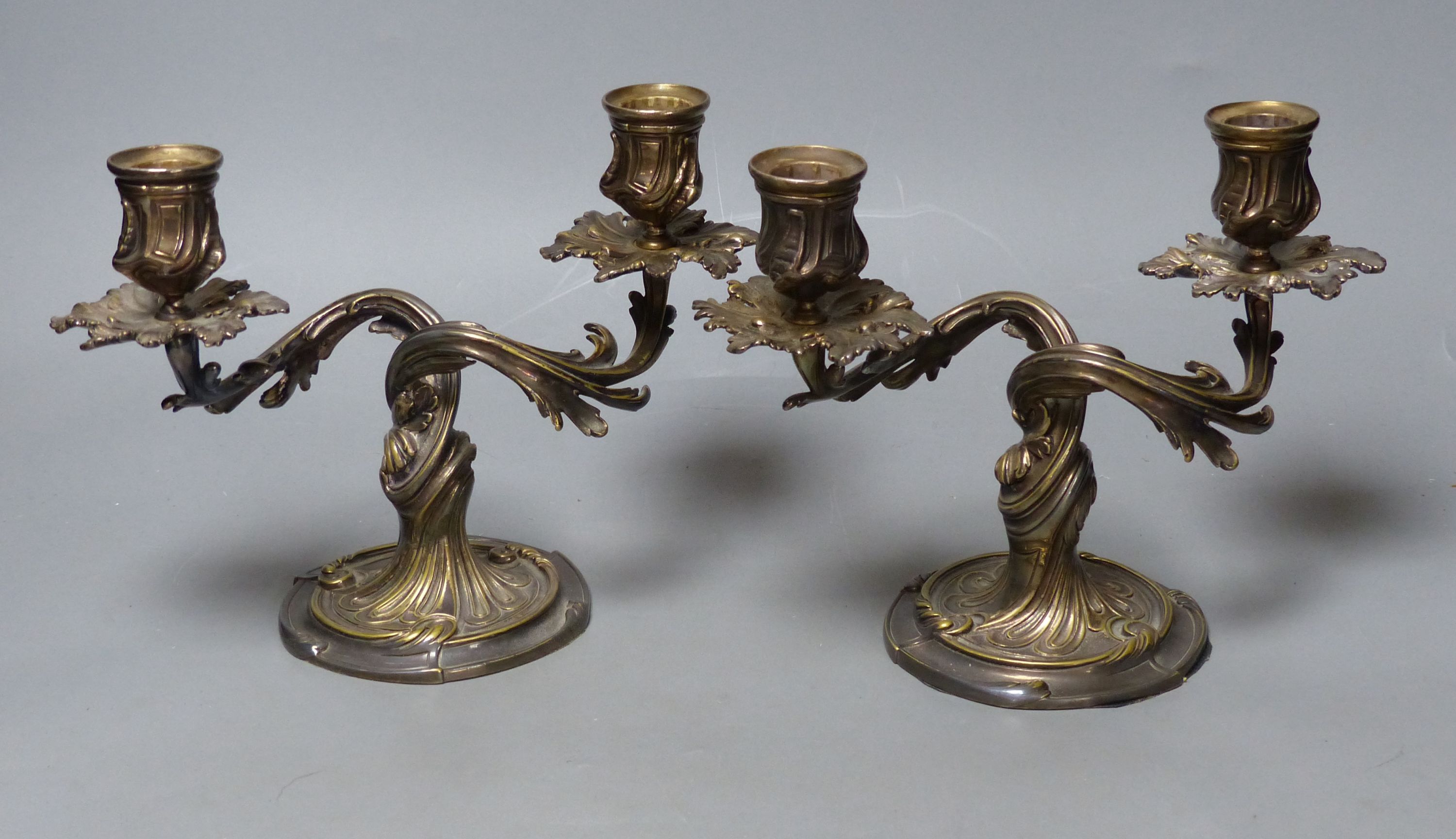 A pair of Christofle plated two-branch candelabra, height 17cm